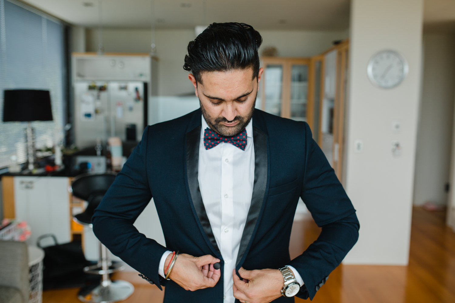 Groom getting ready for his wedding. This image was taken by Mala Photography, an Auckland based wedding photographer. The wedding was at Markovina Vineyard Estate In Kumeu, Auckland