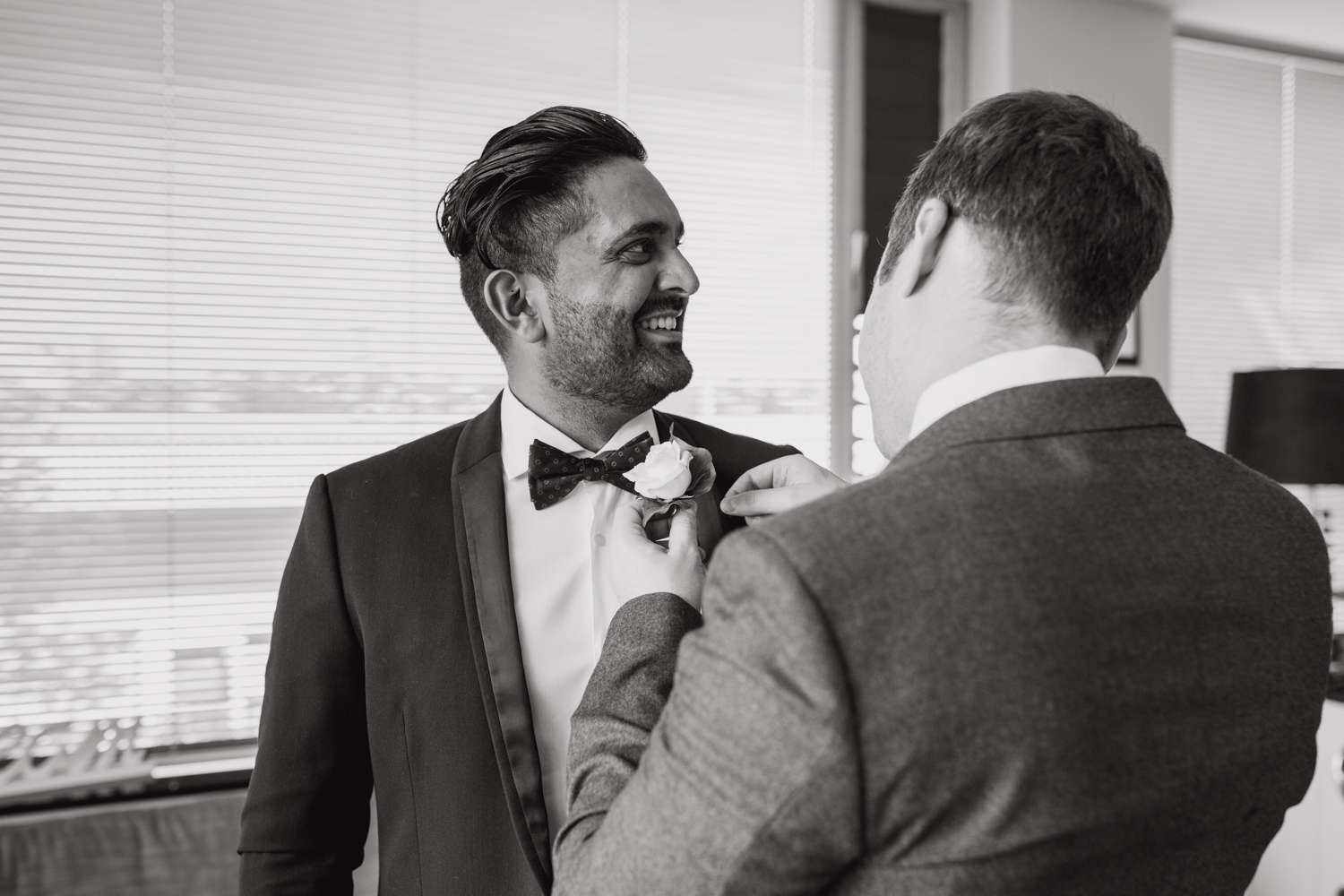 Groom getting ready for his wedding. This image was taken by Mala Photography, an Auckland based wedding photographer. The wedding was at Markovina Vineyard Estate In Kumeu, Auckland