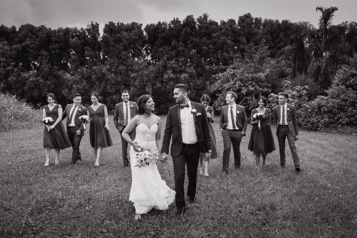 Bride and groom and their bridal party. This image was taken by Mala Photography, an Auckland based wedding photographer. The wedding was at Markovina Vineyard Estate In Kumeu, Auckland